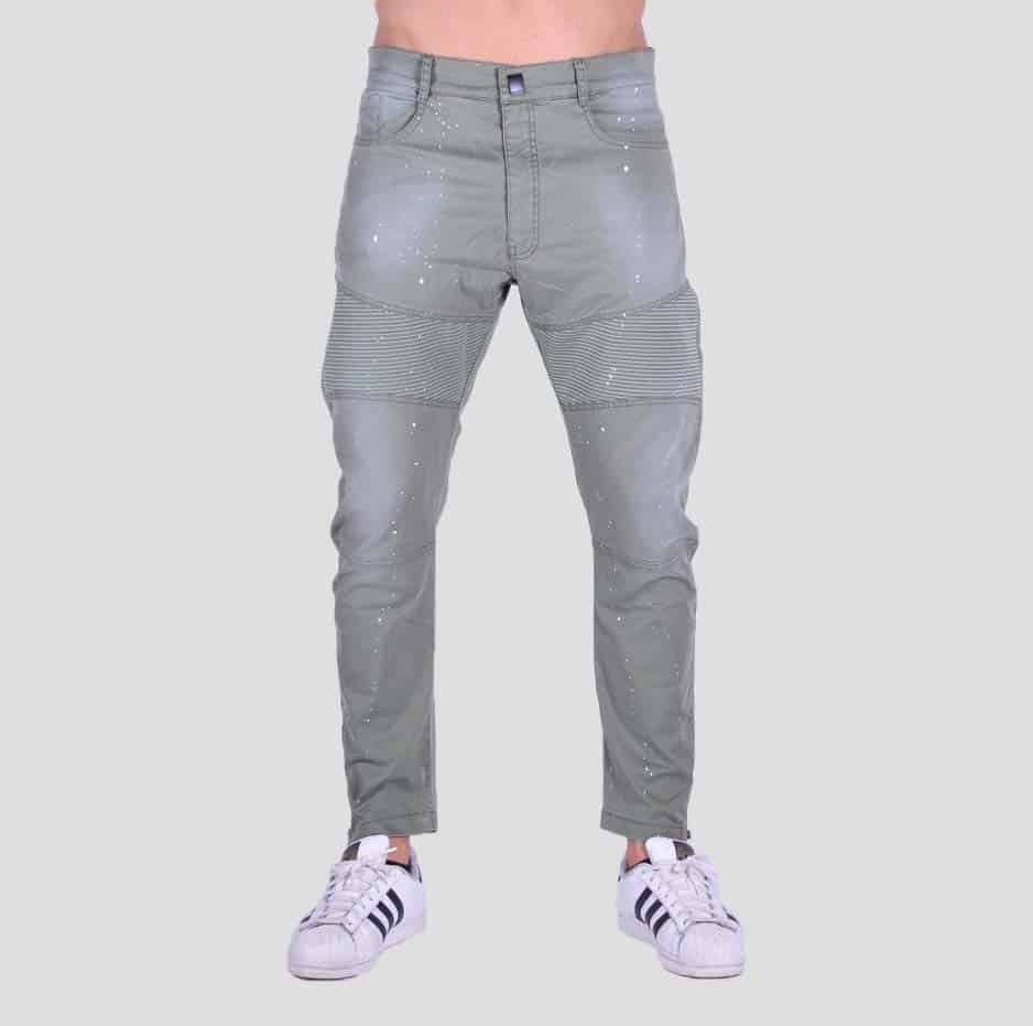 Green zipped pleated pants with paint splashes