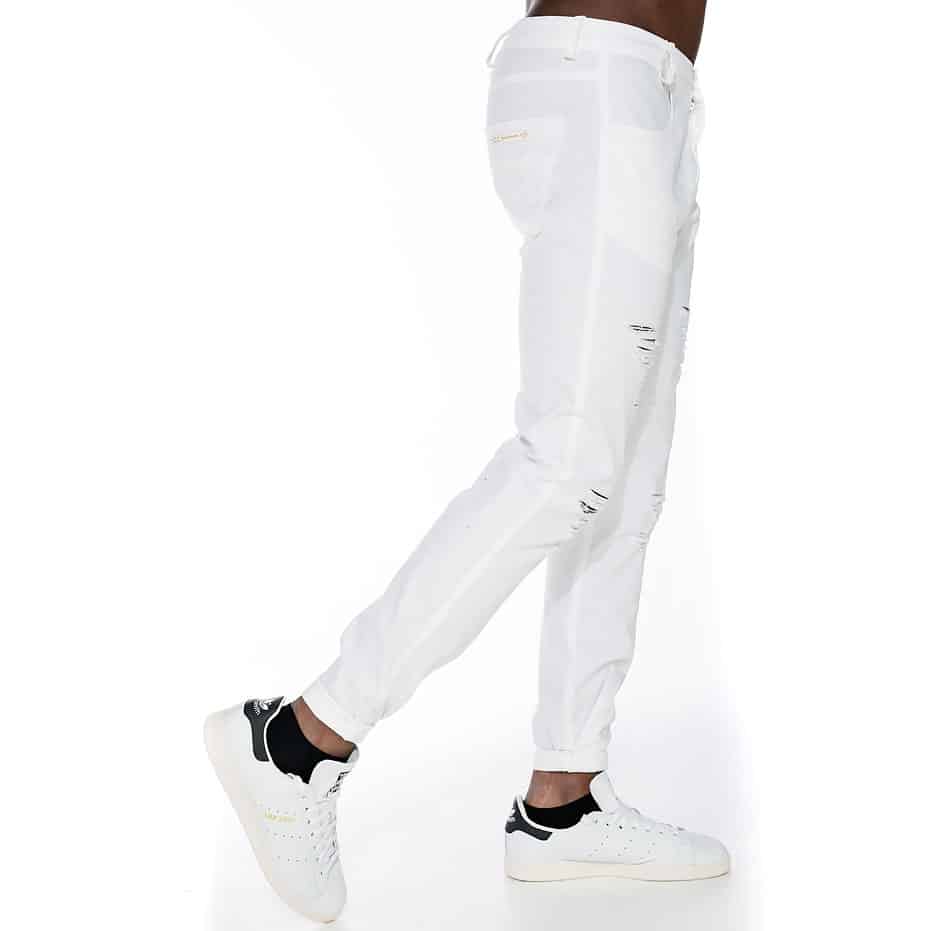White pants with tearings and slim fit
